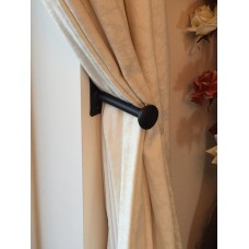 A Pair of Hand Forged Wrought Iron Holdbacks With Button Ends
